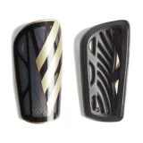 Futbalový chránič ADIDAS TIRO SG LGE BLACK GOLDMT WHITE · záber 1