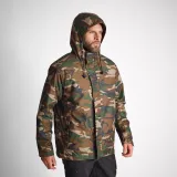 SOLOGNAC Hrejivá nepremokavá bunda 100 maskáčová woodland 3XL · záber 2