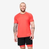 DOMYOS Pánske crossfit tričko Performance Celliant oranžovo-čierne XL · záber 1