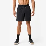 DOMYOS Pánske elastické fitness šortky sivo-čierne M · záber 1