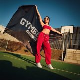 GymBeam Women‘s Varsity Joggers Red - Méret: L | Szín: Piros | Tömeg: 0,6596 g | Csomag: 16 · záber 2