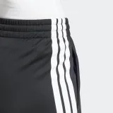 ADIDAS Dámske športové tepláky adidas z polyesteru – čierne XS · záber 2