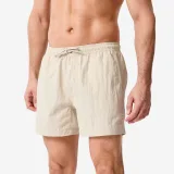 DECATHLON Pánske boardové šortky 100 na surfovanie pokrčené béžové XL · záber 1