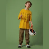Chlapecké loose tričko s potiskem - žluté · záber 1