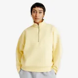 DECATHLON Dámska mikina na zips so stojačikom Elementals bledožltá M · záber 1