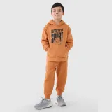 Chlapecké tepláky typu jogger - oranžové · záber 1