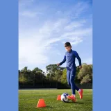 KIPSTA Detské futbalové kopačky VIRALTO III FG koralovočervené 38 · záber 2