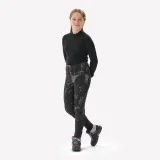 QUECHUA Dievčenské zimné turistické legíny NH100 7-15 r. čierne 8-9 r (131-140 cm) · záber 1