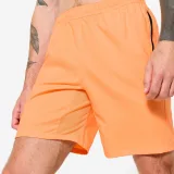 DOMYOS Šortky na fitness s vreckami na zips oranžové 2XL · záber 2