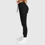 Dámske športové tepláky Iron Aesthetics Comfy, čierne · záber 5