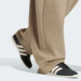 ADIDAS ADIDAS dámske barelové nohavice hnedé XS · záber 2