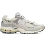 Pánska vychádzková obuv NEW BALANCE U2002REK M off white · záber 2