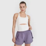 Dámský sportovní rychleschnoucí top slim 4F x Anna Lewandowska - bílý · záber 1