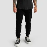 GymBeam Tepláky Limitless Black - Velikost: XL | Barva: čierna · záber 1