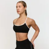 GymBeam Športni nedrček Varsity Black - Velikost: XS | Barva: čierna | Teža: 0,076 g | Pakiranje: 130 · záber 3