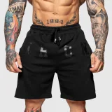 Teplákové kraťasy Iron Aesthetics College, čierne · záber 1