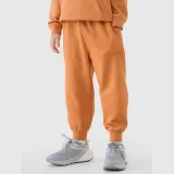 Chlapecké tepláky typu jogger - oranžové · záber 2