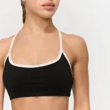GymBeam Športni nedrček Varsity Black - Velikost: XS | Barva: čierna | Teža: 0,076 g | Pakiranje: 130 · záber 2