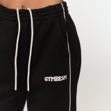 GymBeam Women‘s Varsity Sweatpants Black - Méret: XL | Szín: Fekete | Tömeg: 0,9914 g | Csomag: 14 · záber 4