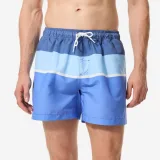 DECATHLON Pánske boardové šortky 100 Strippy na surfovanie modré 2XL · záber 1