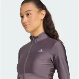 Dámská tréninková mikina se zipem ADIDAS HYG SHN TRACK J GRESTR TAUOXI · záber 2