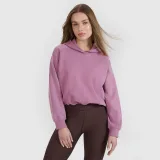 Dámská tepláková mikina cropped bez zapínání s kapucí 4F x Anna Lewandowska - růžová · záber 1