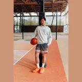 TARMAK Unisex basketbalové šortky NBA 900 zeleno-oranžové S · záber 1