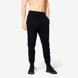 DOMYOS Pánske slim tepláky na cvičenie čierne S (W30 L33) · záber 1