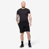 DOMYOS Pánske fitness tričko strih slim čierne M · záber 1